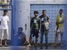 Nearly 100 migrants rescued from a yacht off southwestern Greece