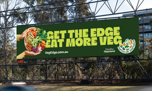 Billboard advertisement reading Get the Edge Eat More Veg