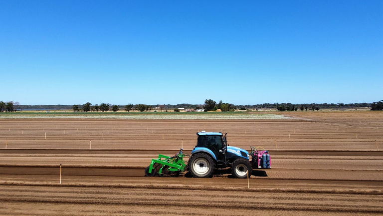 TriCal Australia Strike soil fumigants advertisement showing a tractor fumigating a field