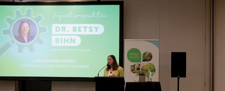 Dr Betsy Bihn delivering a keynote presentation on empowering people and optimising food safety training